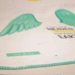 زیرانداز تعویض ضد آب دی روحه Die Ruhe طرح بال فرشته رنگ سبزآبی